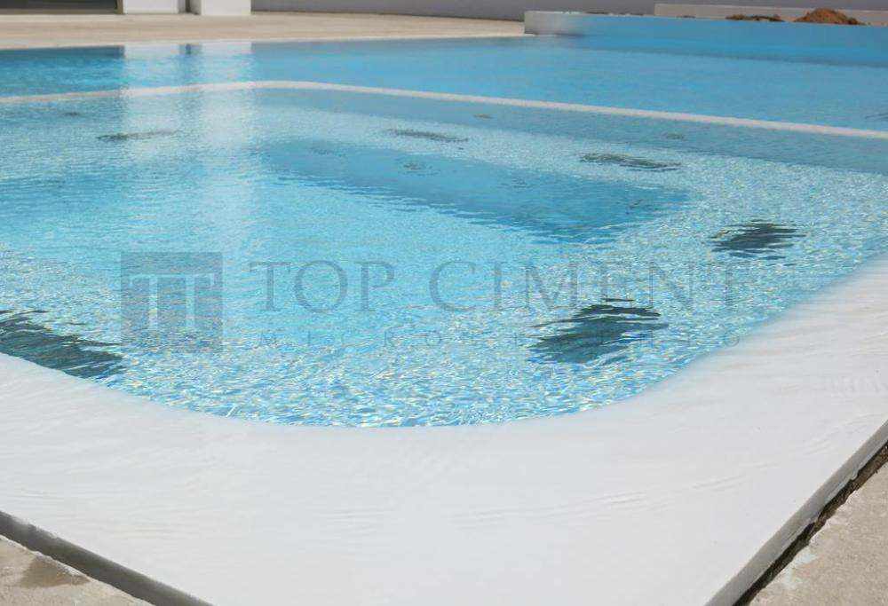 Foto de Piscina con jacuzzi de diseño moderno y elegante, revestidas con microcemento Aquaciment