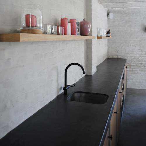 Countertop coated with black microcement