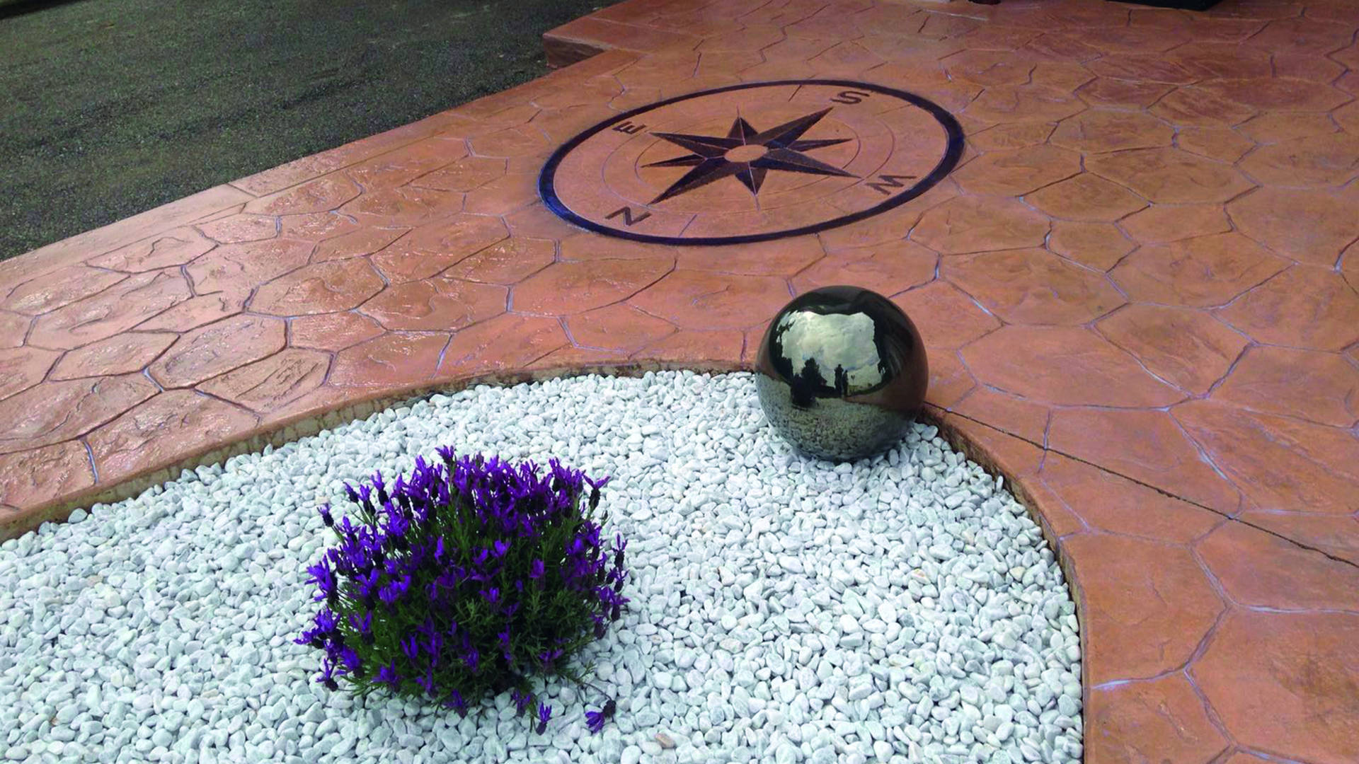 urbanisation with imprinted concrete floor and compass rose