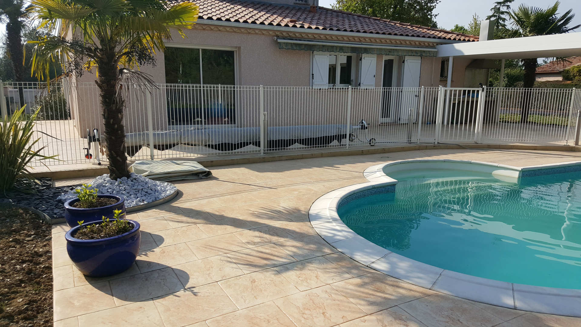 housing with imprinted concrete terrace pool