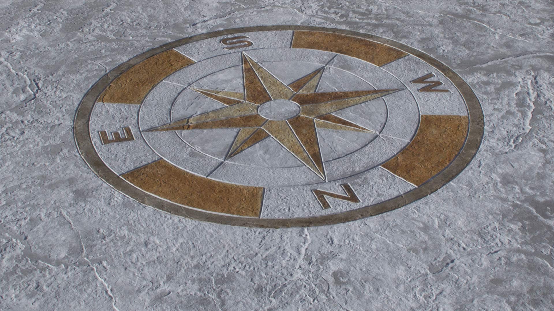 Imprinted pavement with compass rose mould