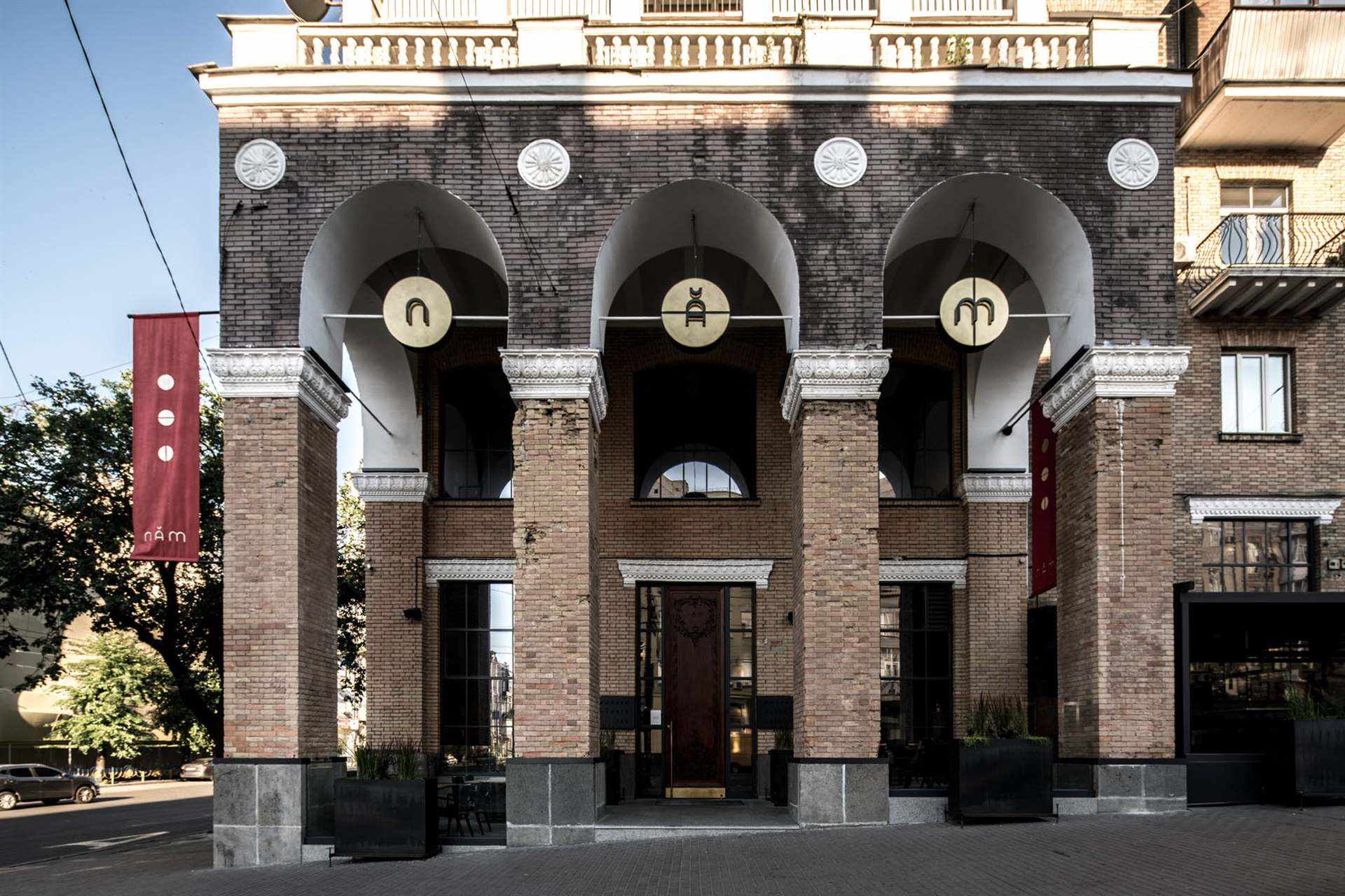 Exterior of a restaurant clad with microcement.