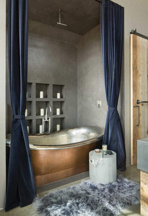 Renovated shower with microcement on ceiling and walls of a ranch.