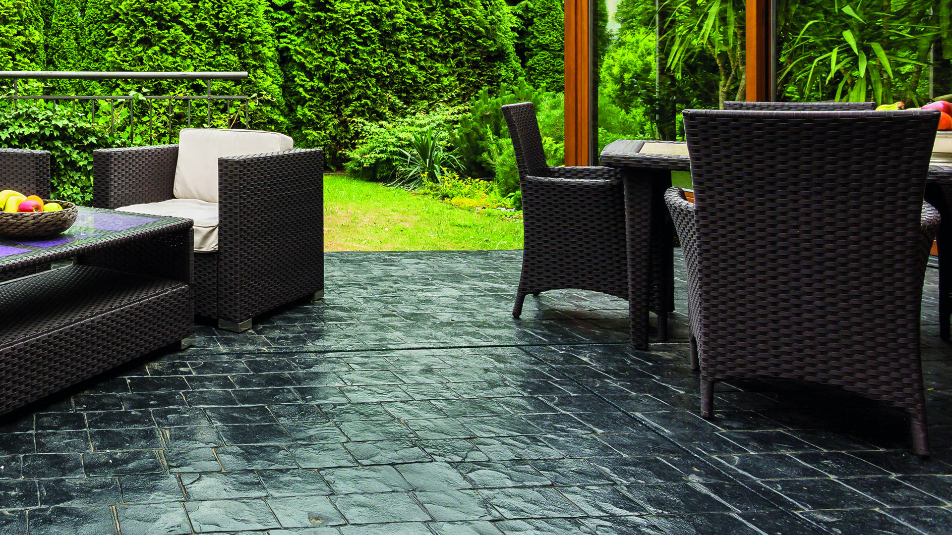 house porch with black stone imitation imprinted concrete pavement