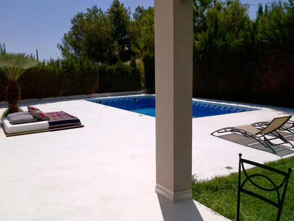 White microcement outdoor terrace floor