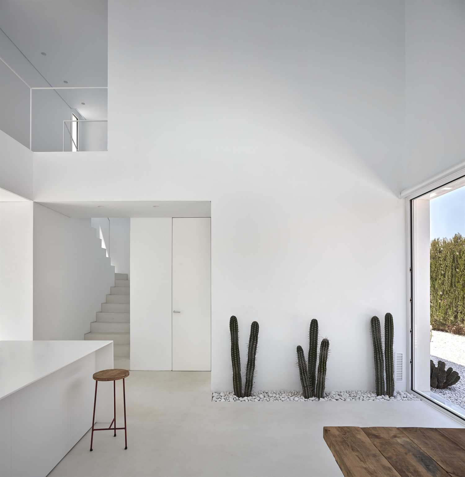 Microcement on floor and stairs of open kitchen.