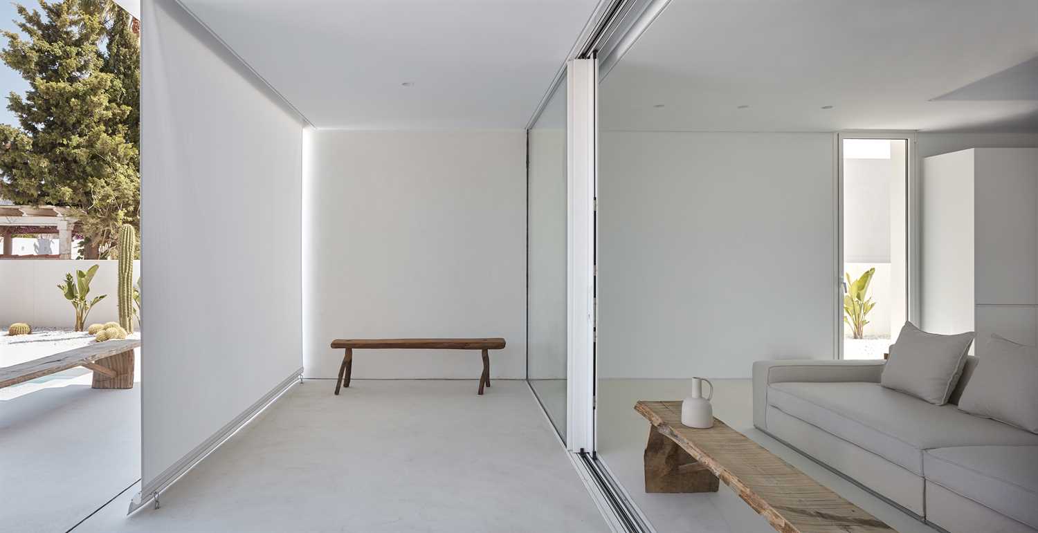 White microcement terrace in renovated house.