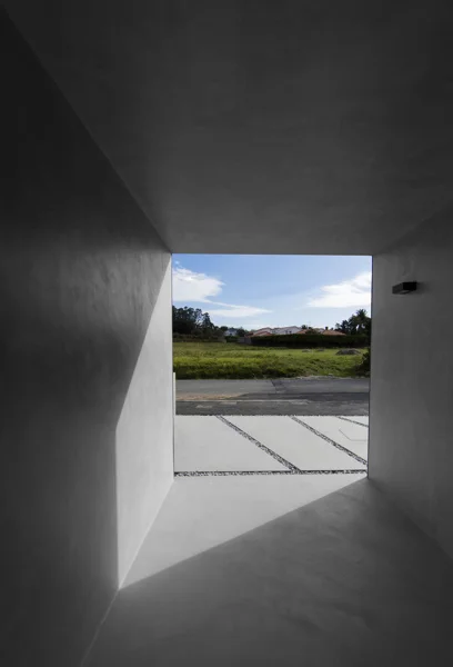 Exterior gray microcement floor and walls