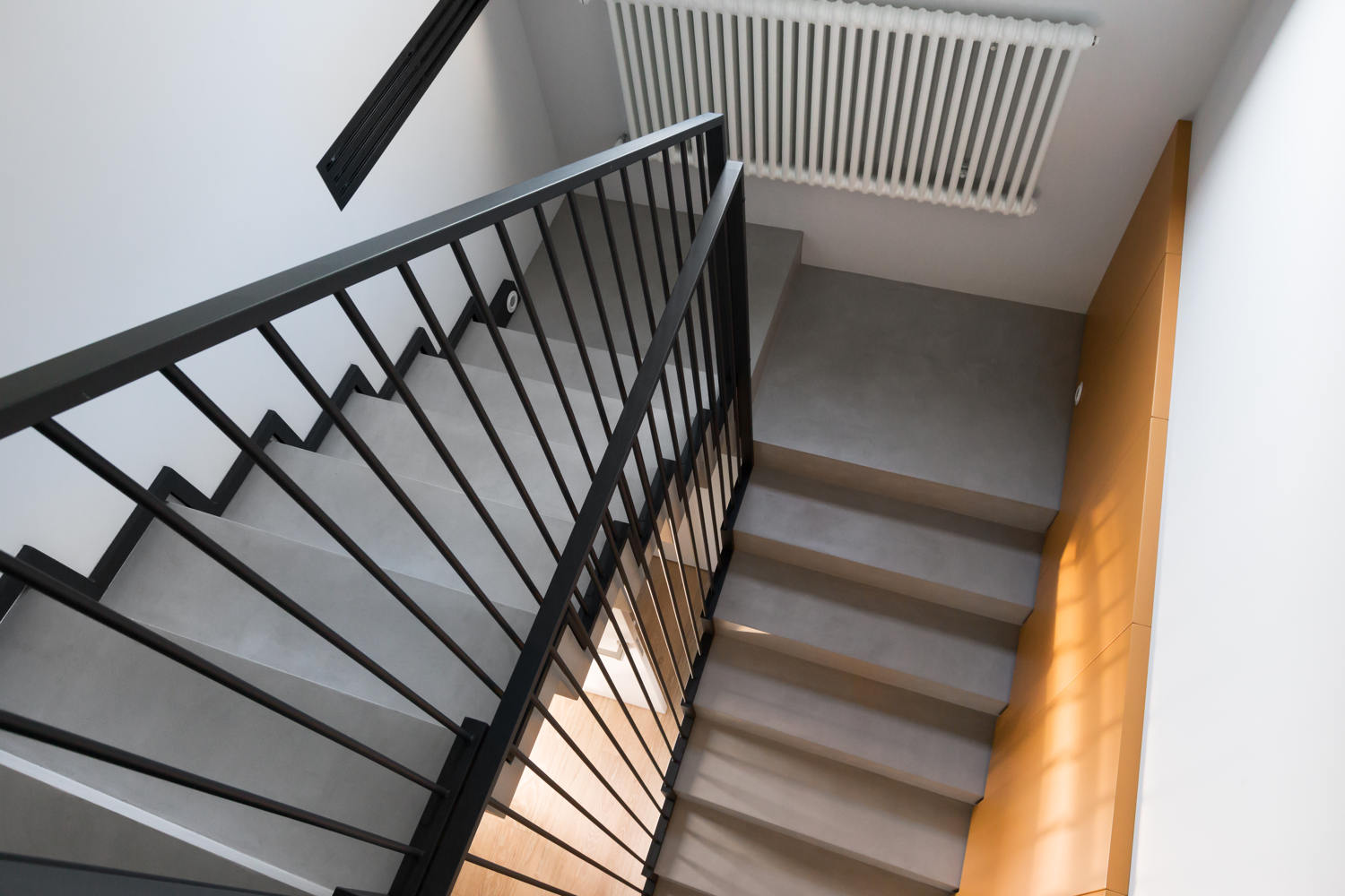 gray microcement staircase housing