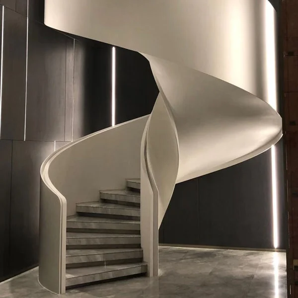 espectacular escalera de microcemento gris en espiral