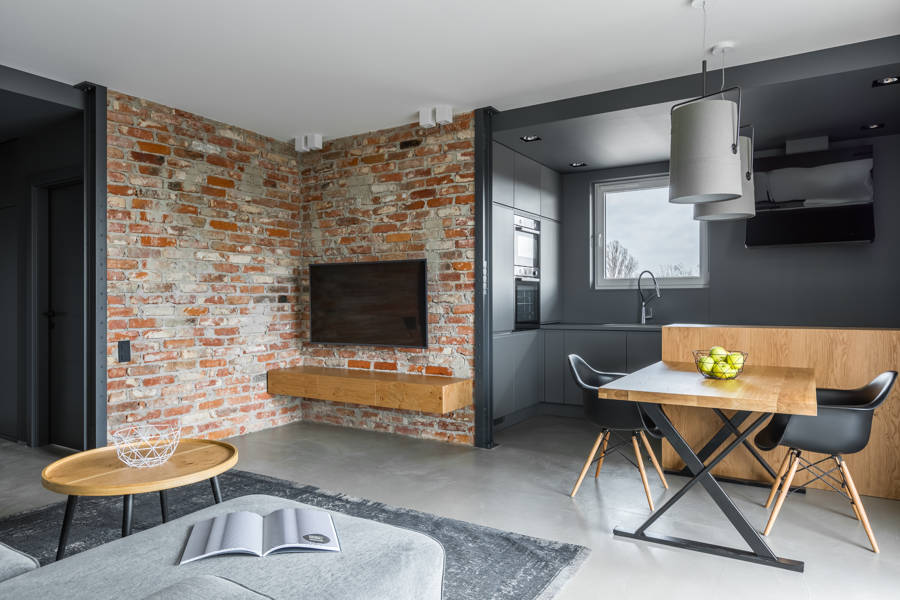 loft con revestimiento de pared de ladrillo