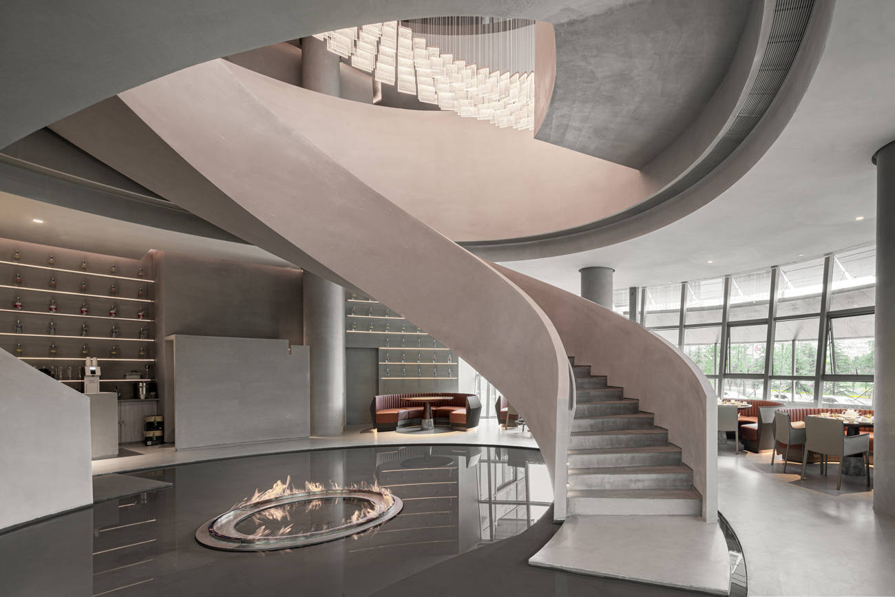 Elegant restaurant with microcement staircase in Victoria. 