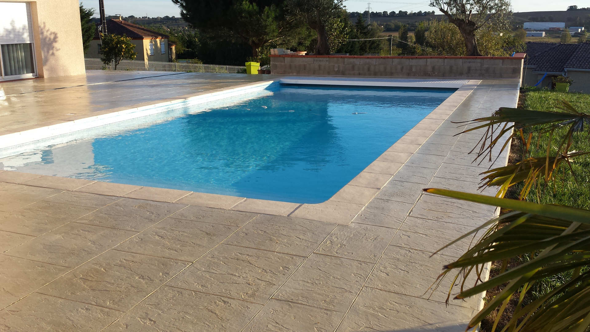 rectangular stamped concrete swimming pool 