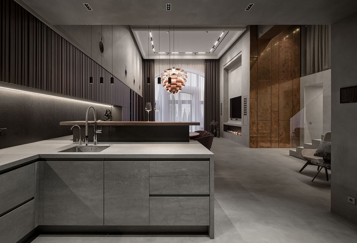 Kuchyňa otvorená do obývačky s mikrocementom sivej farby